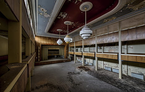 empty building with three chandeliers thumbnail