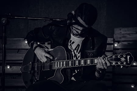 man playing guitar thumbnail