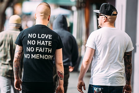 two men walking outdoors thumbnail