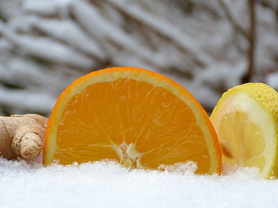 sliced citrus fruit beside ginger thumbnail