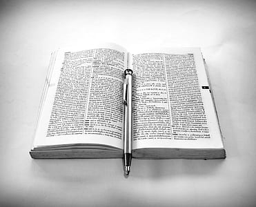 gray pen on book thumbnail