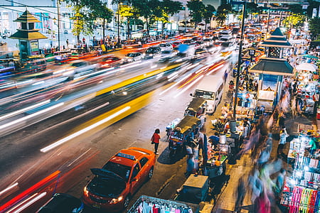 time-lapse photography of vehicles on road thumbnail