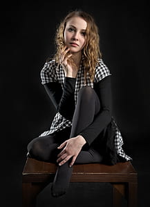 woman in white and black checkered button-up shirt thumbnail