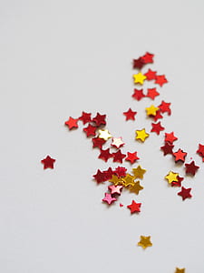 assorted-color star accessory on white surface thumbnail