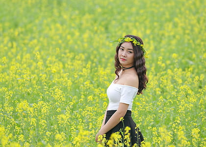 woman wearing white off-shoulder dress and black skirt thumbnail