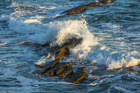 sea waves on rocks thumbnail