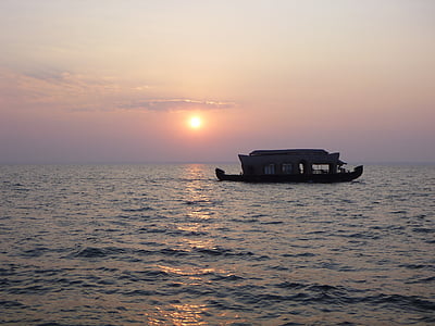 boat silhouette during golden hour thumbnail