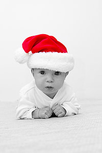 gray scale photo of baby wearing Santa hat thumbnail
