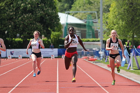 three women running on track thumbnail