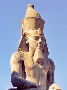 closeup photography of pharaoh statue during daytime thumbnail