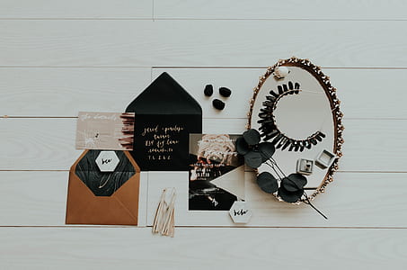 flat lay photography of three letters and oval mirror thumbnail