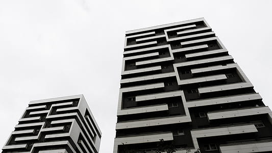 worm's eye view photo of buildings during daytime thumbnail