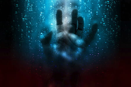 left human hand touching blue screen thumbnail