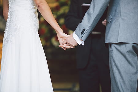 woman and man holding hands thumbnail