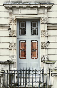 closed blue wooden door at daytime thumbnail