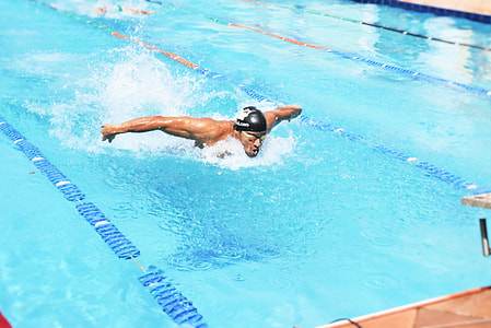 man swimming at pool near edge thumbnail