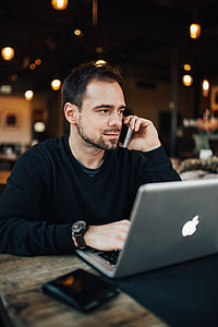 Young Entrepreneur Working from a Modern Cafe thumbnail