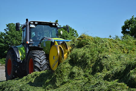 black, yellow, and blue tractor thumbnail