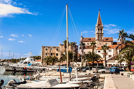 boats parked on port thumbnail