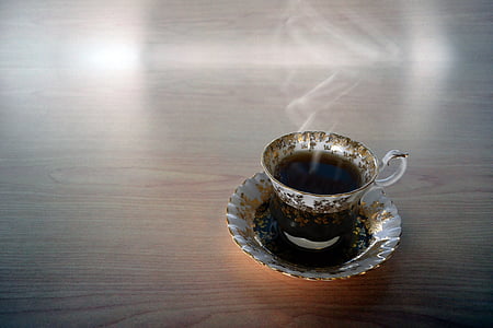 cup filled with black substance thumbnail