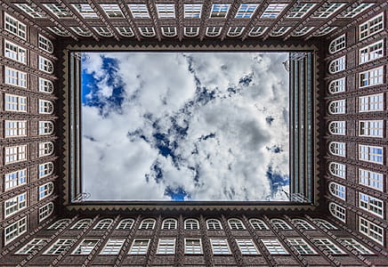 low angle photography of gray building thumbnail