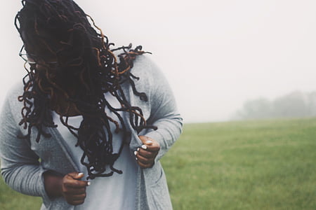 woman wearing gray cardigan thumbnail