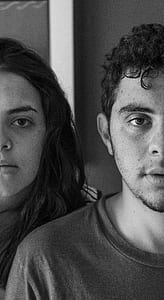 grayscale photo of man and woman portrait thumbnail