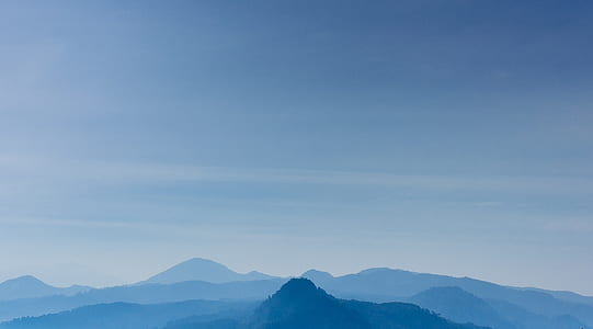 mountains under white and blue sky thumbnail