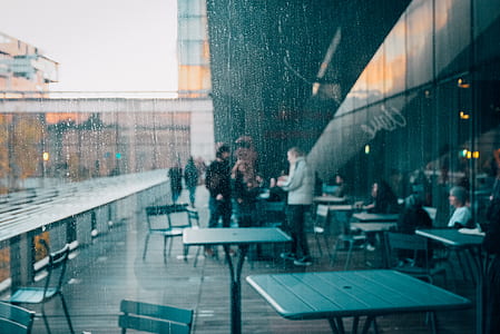 people gathering outside cafe thumbnail