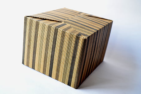 brown and black labeled box on white surface thumbnail