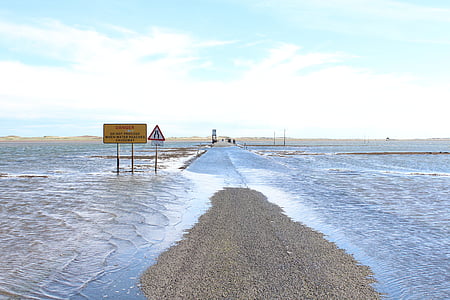 high tide water on the road thumbnail