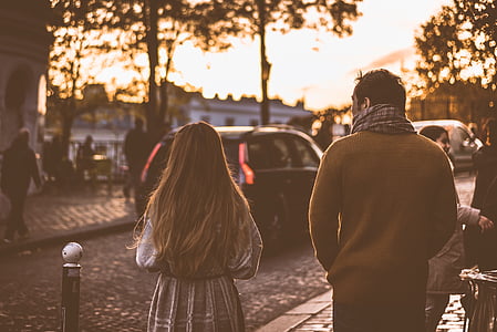 man and woman standing near street thumbnail