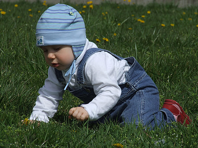 toddler playing on lawn thumbnail