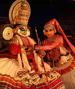 two traditional woman performing thumbnail
