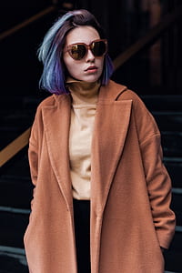 woman wearing brown suede overcoat thumbnail