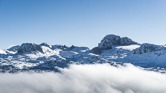 snow covered mountain at daytime thumbnail