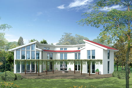white concrete 2-storey house surrounded by green leafed trees thumbnail