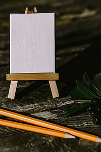 Small flowers, pencils and other things on wood thumbnail