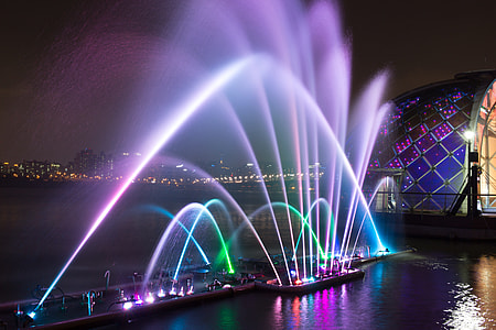 assorted-color manmade fountain at nighttime thumbnail