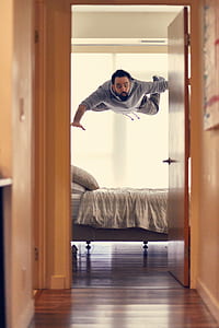 man floating inside room thumbnail