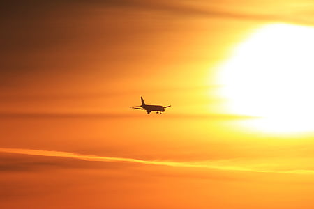 silhouette photography of airliner on flight thumbnail