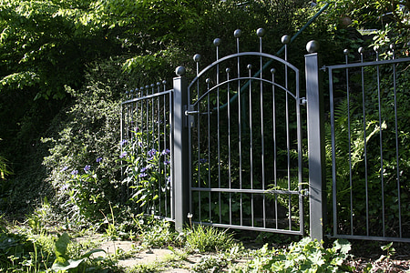 closed black metal gate thumbnail