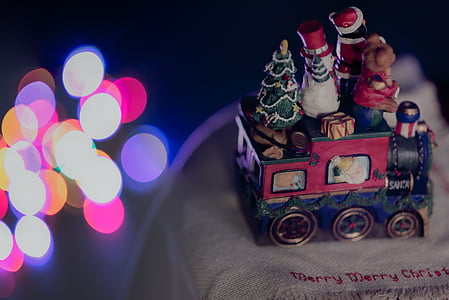 selective focus photography of train toy thumbnail