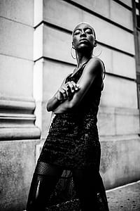 grayscale photography of woman wearing tank dress thumbnail