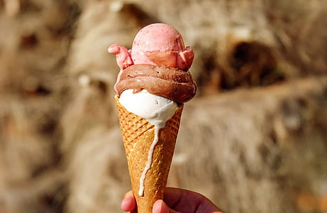 close up photography of ice cream cone during daytime thumbnail