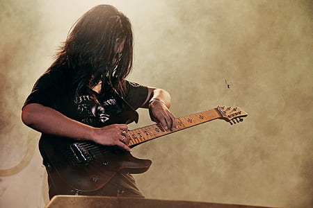 person playing guitar thumbnail
