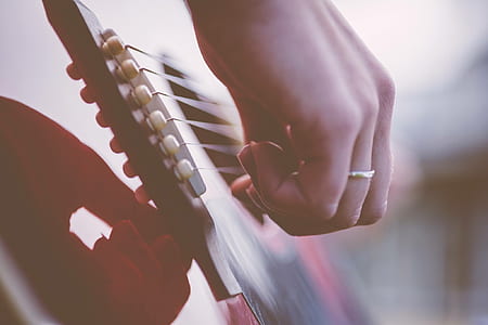 person playing guitar thumbnail