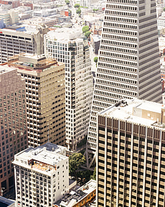 white and beige concrete buildings during daytime thumbnail
