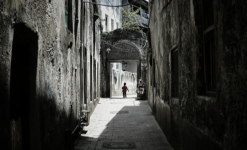 person standing on alleway thumbnail