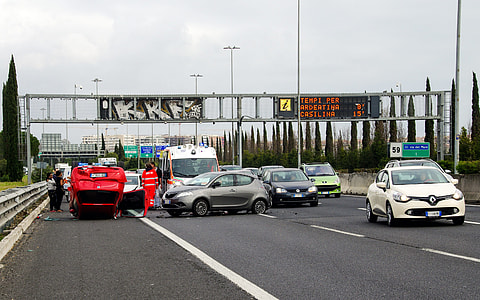 assorted-color vehicles on asphalt road thumbnail